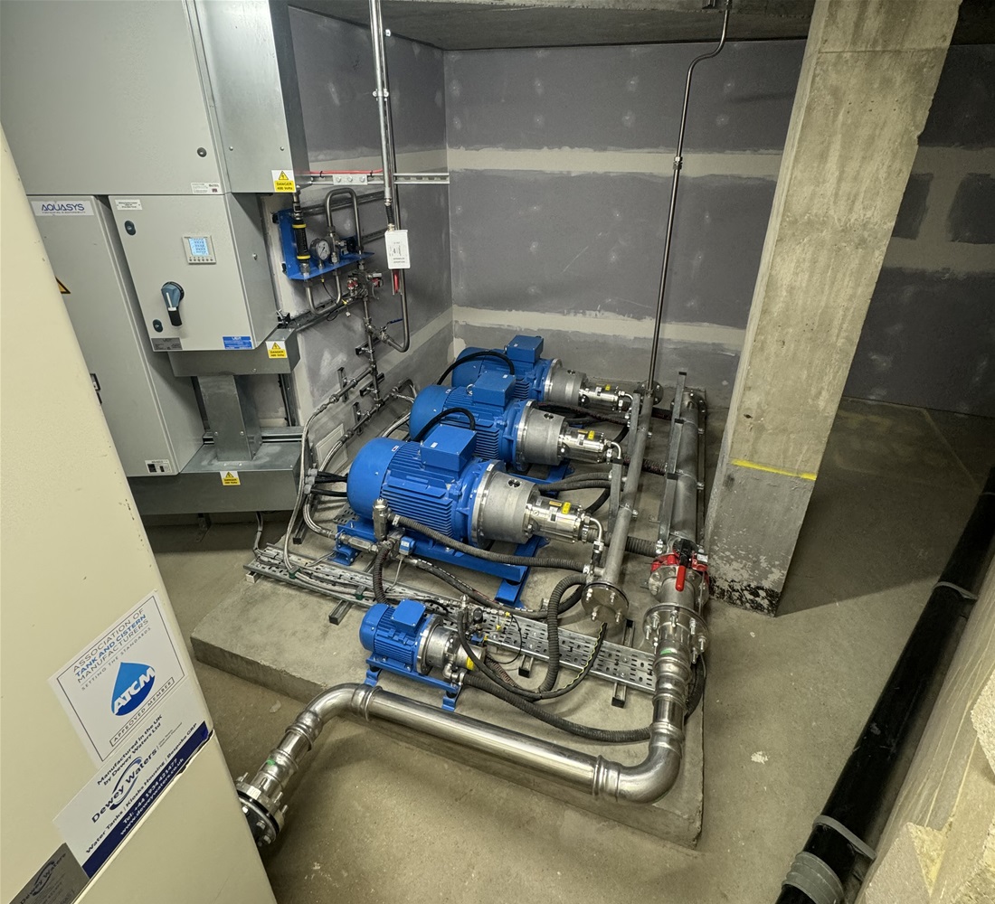 high pressure water mist fire suppression pumps installed in the basement of a london apartment building.